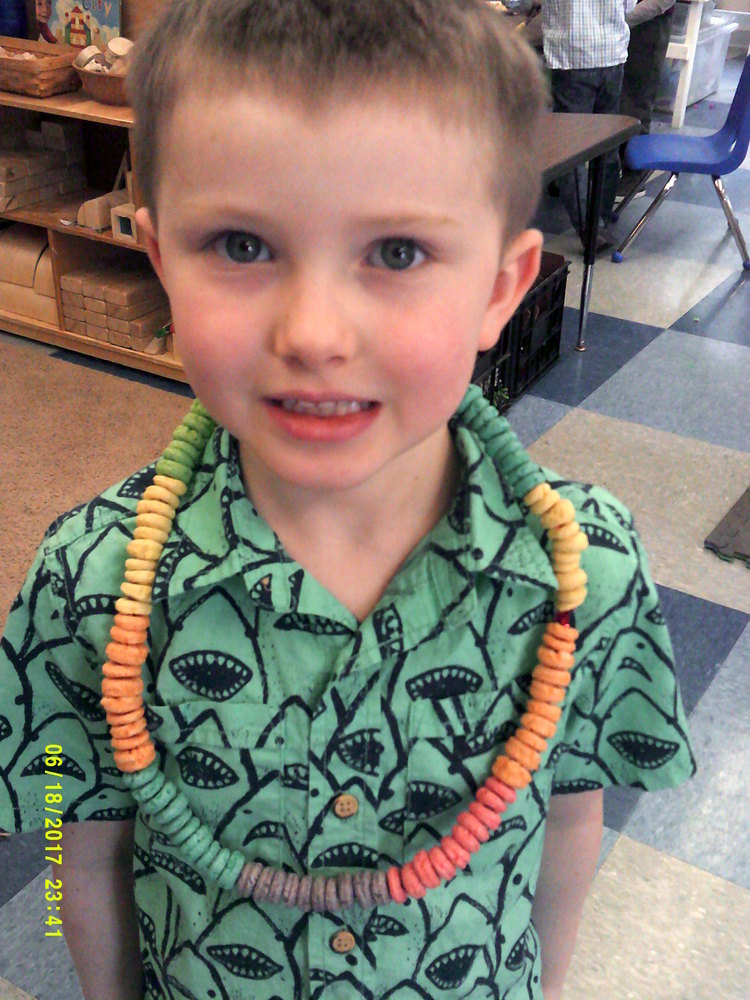 Irvin made a necklace with 100 Fruit Loops!