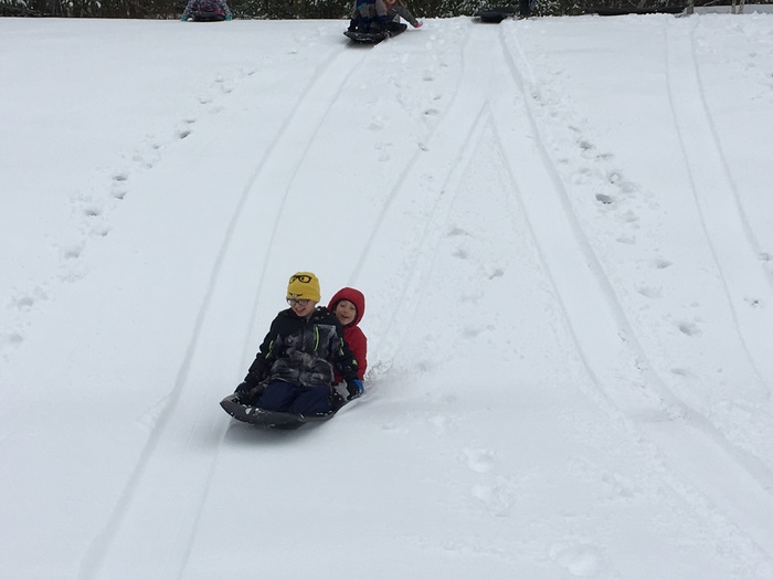 Nicky and Collin have a great run on hte sled