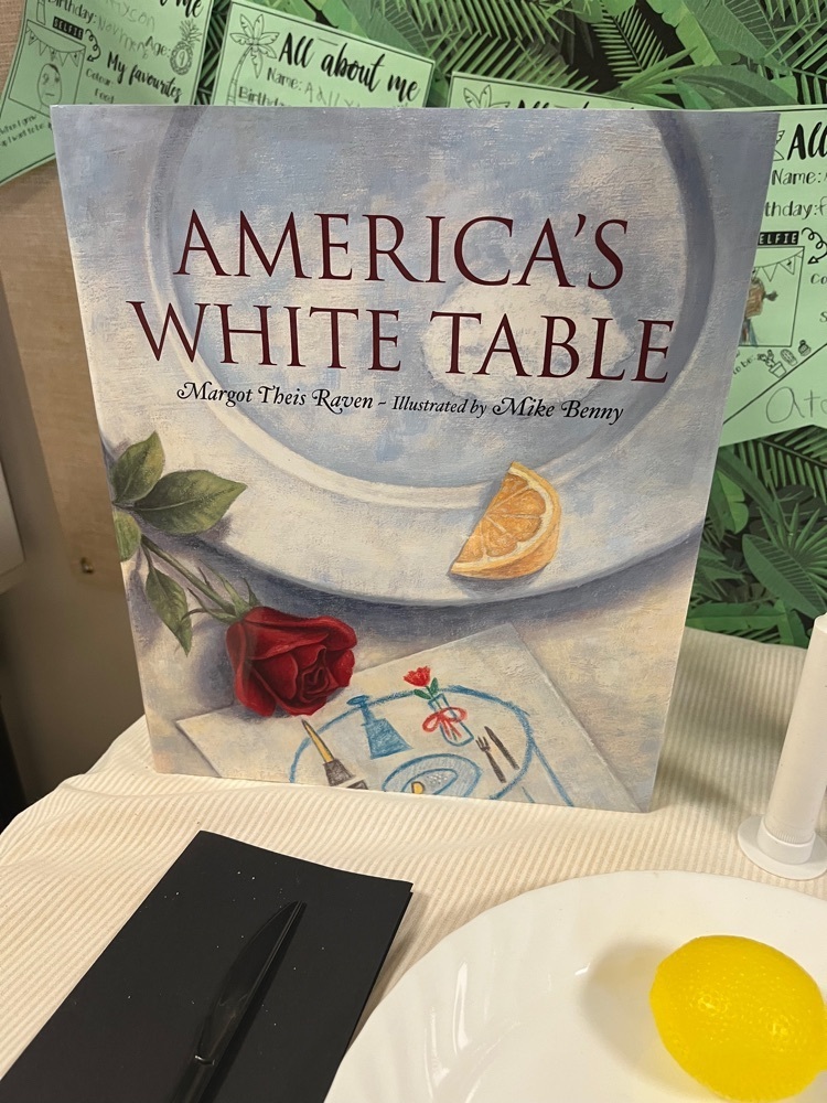 cover of America’s White Table on a table set up by students