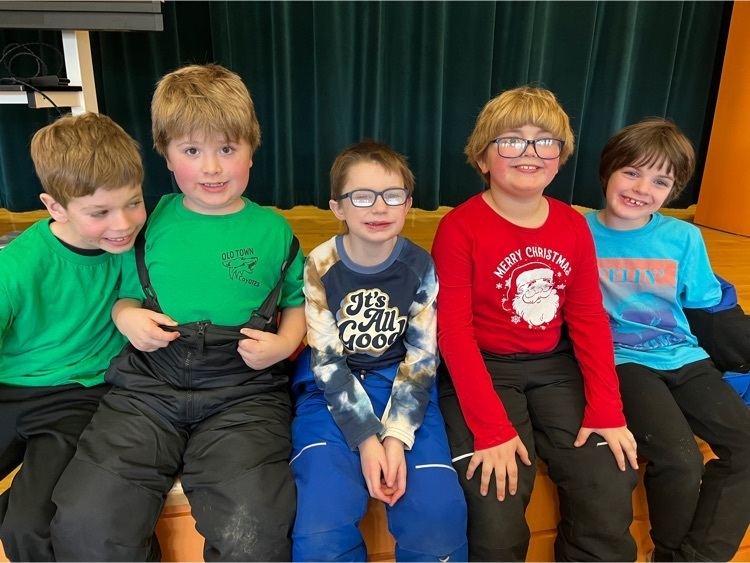 second graders wearing shirts with positive messages