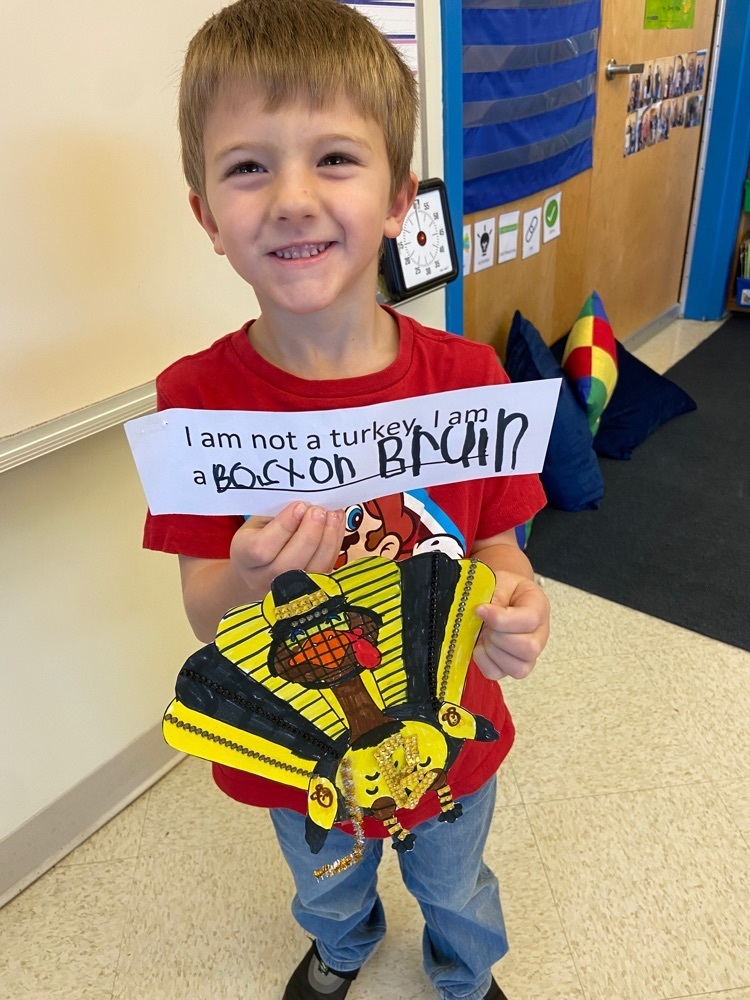 Kindergartener with turkey picture disguised as a Boston Bruin